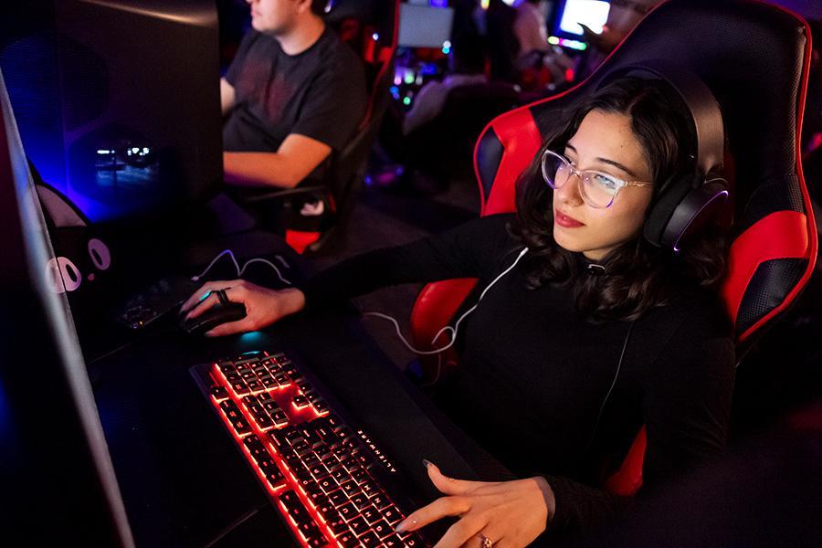 An Esports player concentrates while playing.