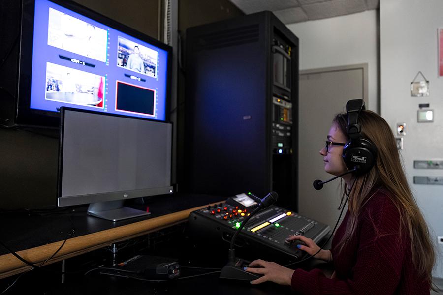 A student edits a TV show at Iona University.