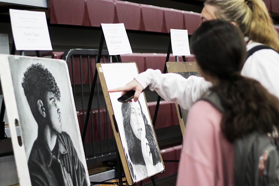 The self-portrait drawings at Iona Scholars Day.