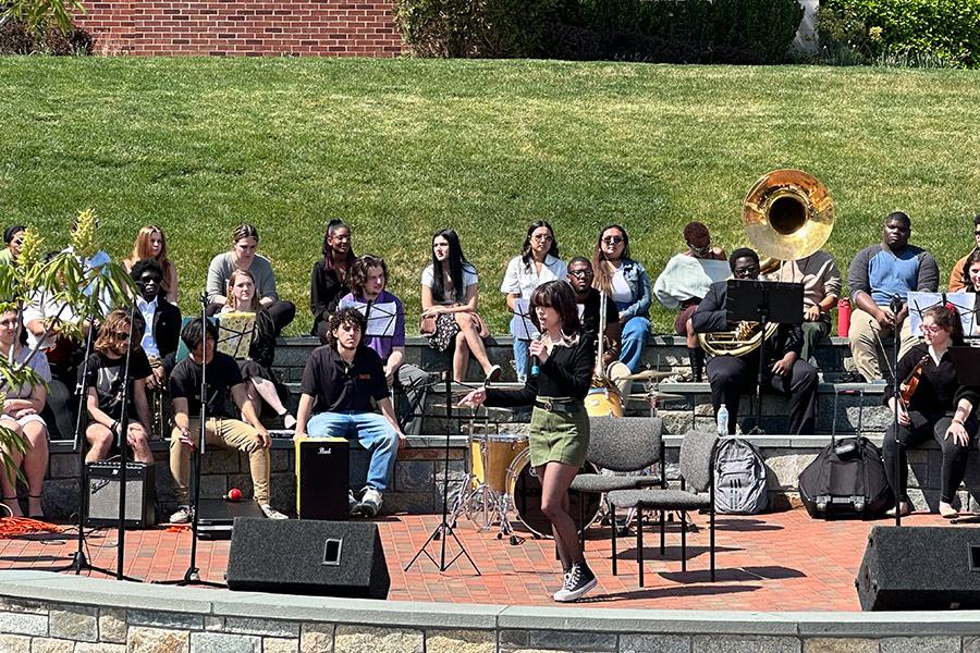 A singer performing a Broadway show tune at Iona Scholars Day.