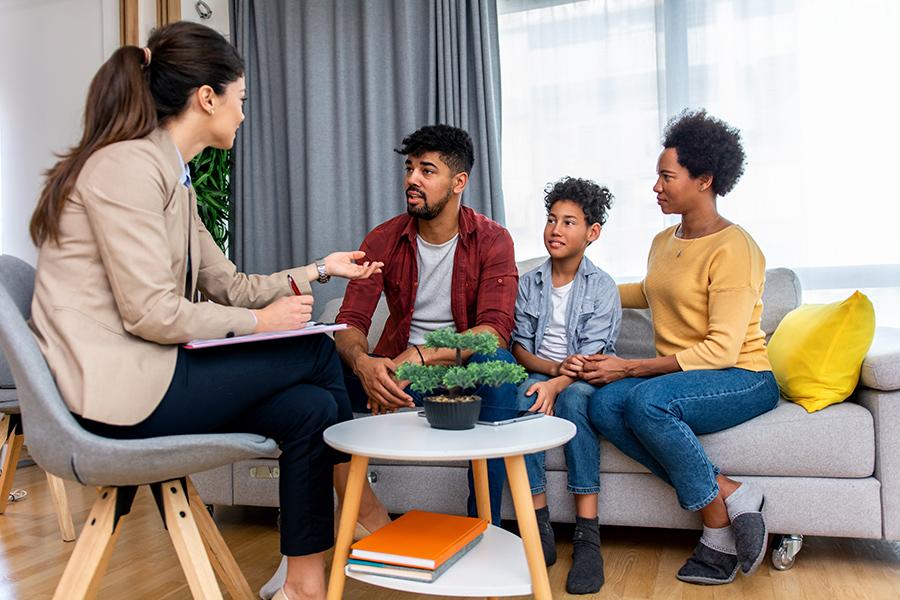 A family of three in therapy.