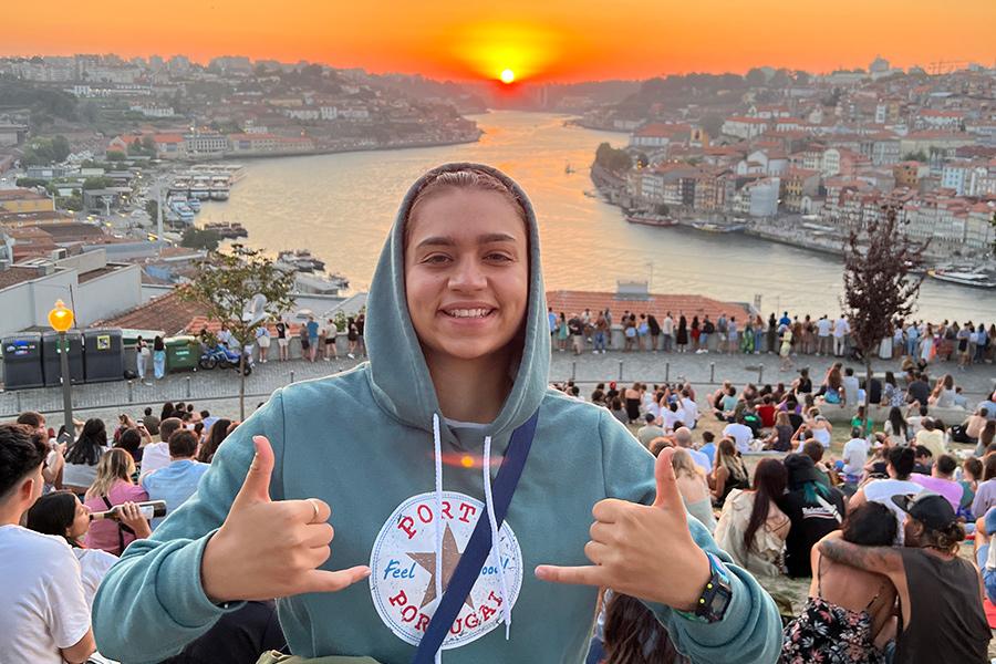 Leah posing for a sunset in Portugal.