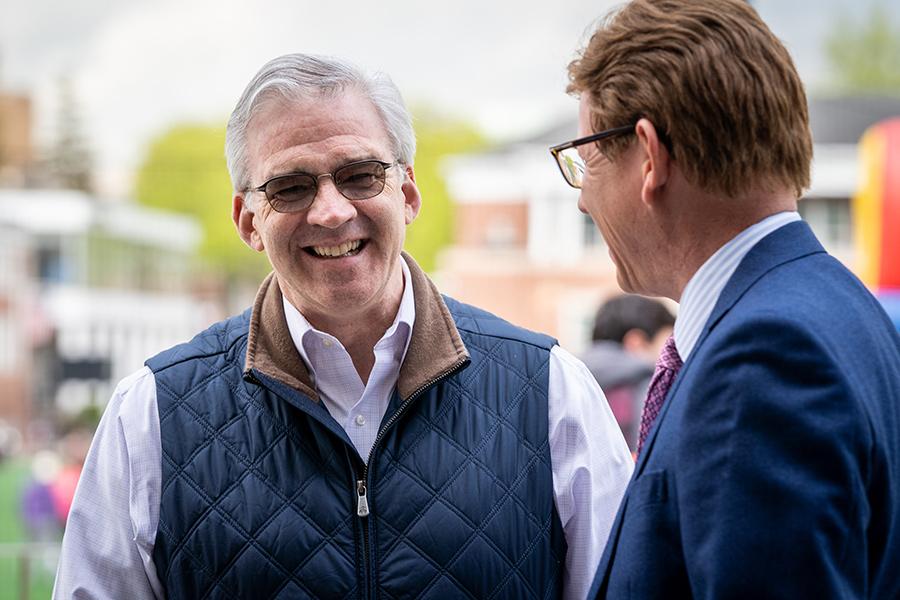 President Carey speaks with Thomas H.