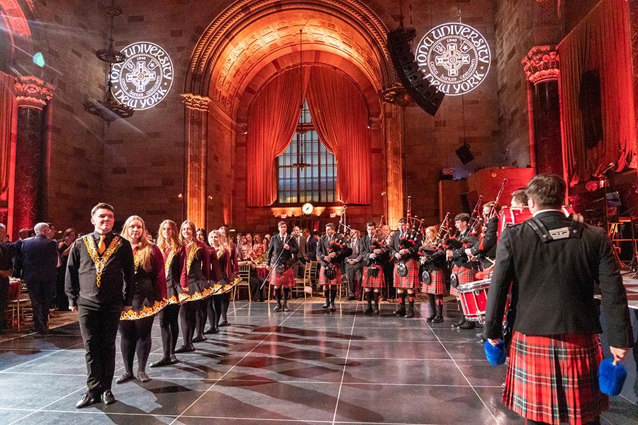 The Piper Band and Irish Step Team perform at the 2023 Gala.