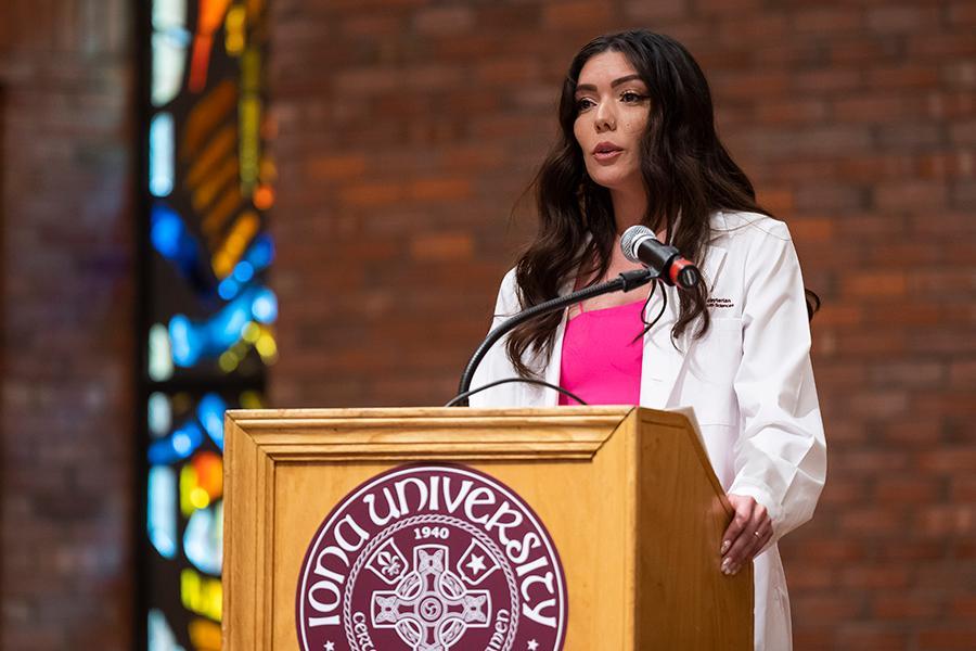 A student speaks at the pinning ceremony.