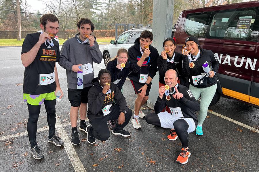 The Co-Ed running team showing their medals.