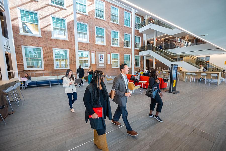 LSB students walking in the atrium.