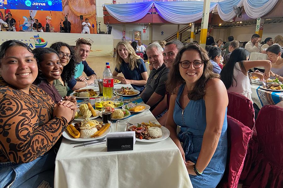 Particpants enjoying a meal in a restaurant in Peru.