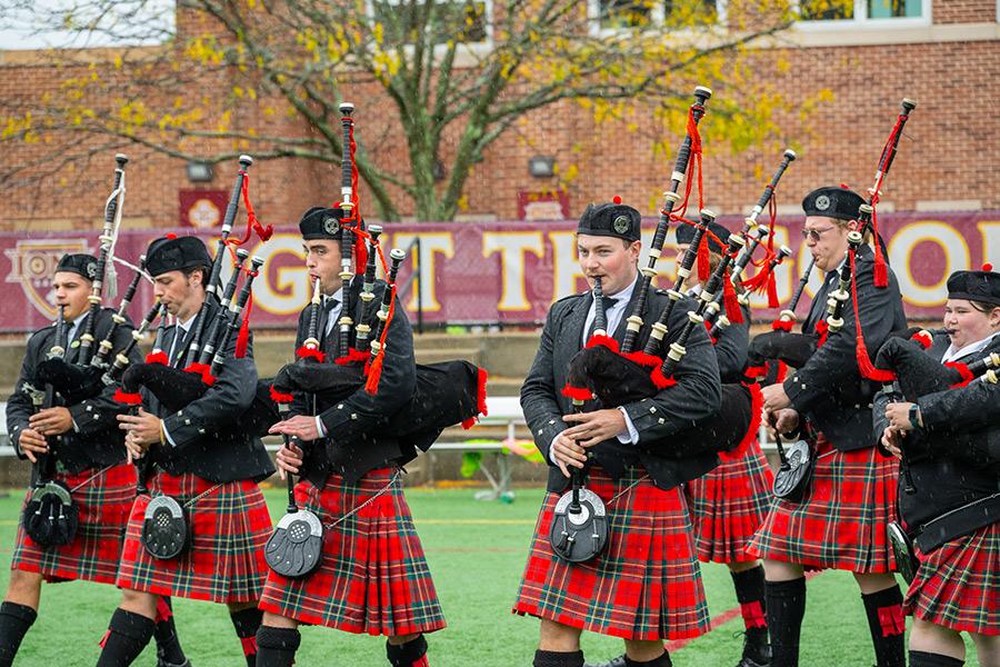 The pipers play on Mazzella Field.