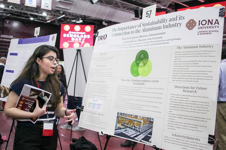 A student presenting on Aluminum and its Connection to Sustainability.