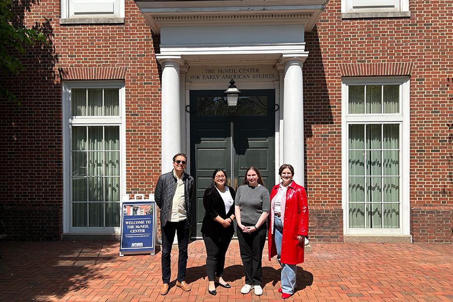 Dr. Michael Crowder, Michelle Chuchuca ’24, Hannah Parisi ’24 and Dr. Nora Slonimsky in front of the McNeil House.