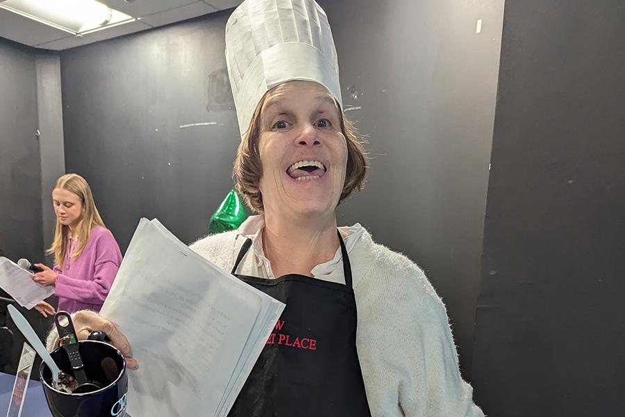 A chef smiles at the CPW talent showcase.