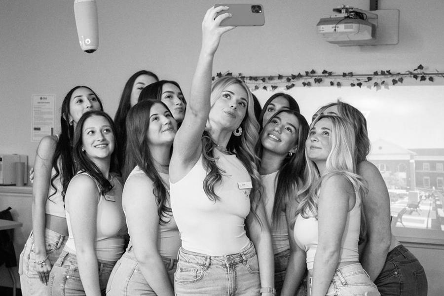 Members of Phi Sig do a selfie.