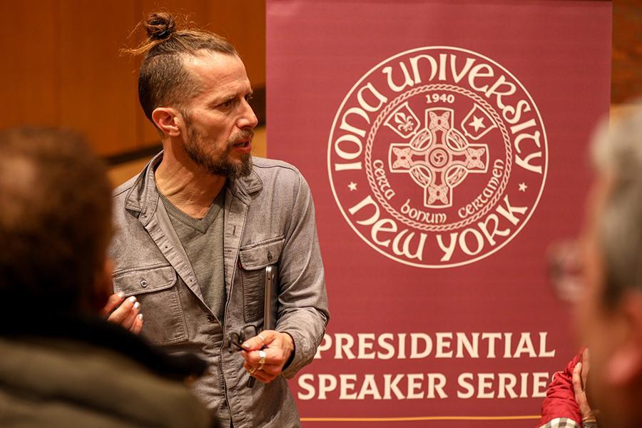 D. Graham Burnett speaking on the Bronxville campus.