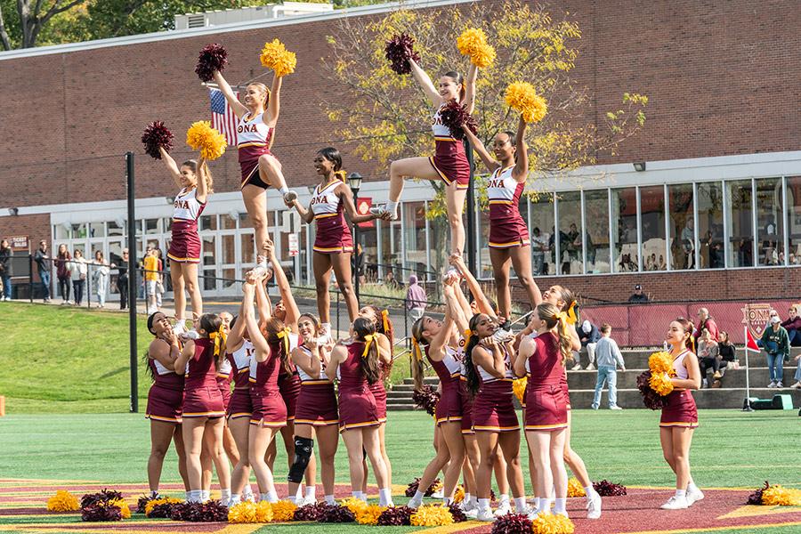 Iona Cheerleading Team performing on the Mazzella Field during Homecoming Weekend 2025.