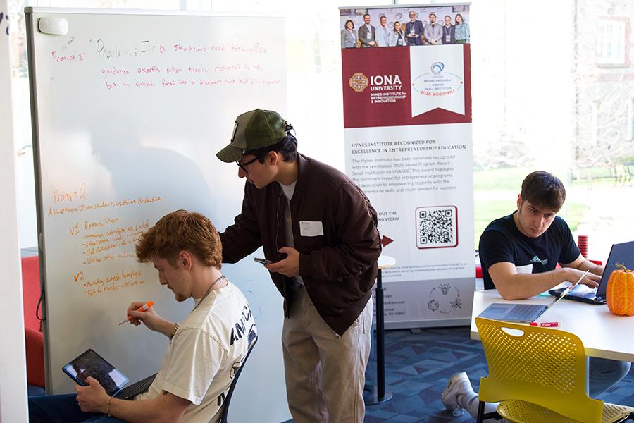 Students in the AI club working together.