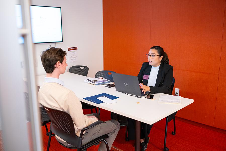 A counselor meets with a student.