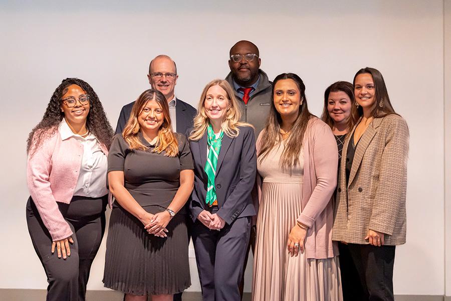 Faculty posing for group photo.