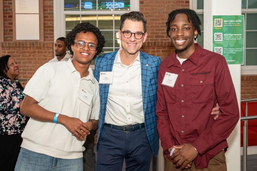 Mentor and mentees at networking event