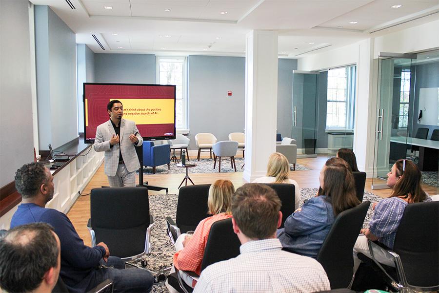 A faculty fellow presents at the GCTL.