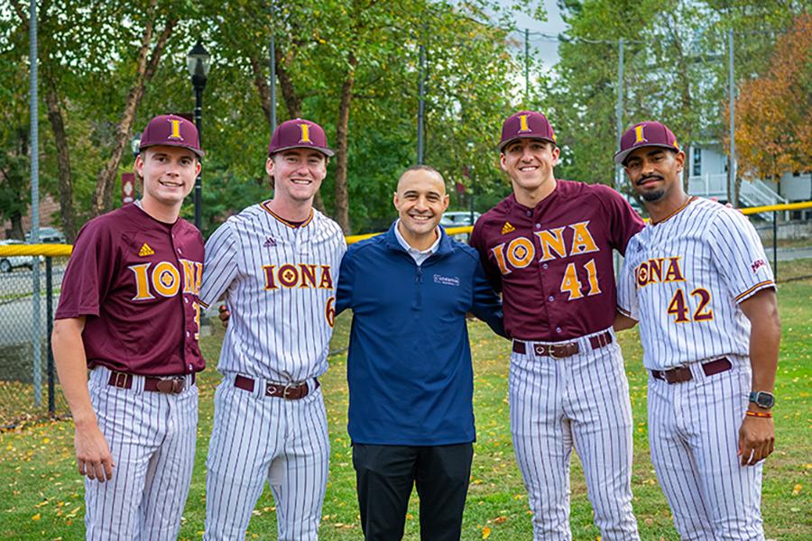 Matt Rizzetta Standing With Four Baseball Players For A Picture