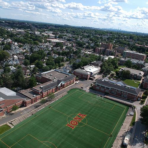 Overhead of Mazzella Field with the city of New Rochelle in the background.