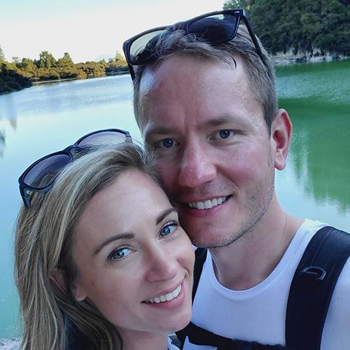 Bill and Amanda Pientka in a boat on a river.