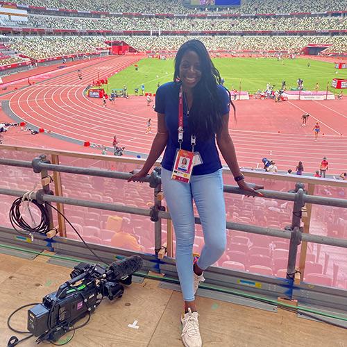 Mary Omatiga stands in the stadium at the Olympics in Tokyo, Japan.