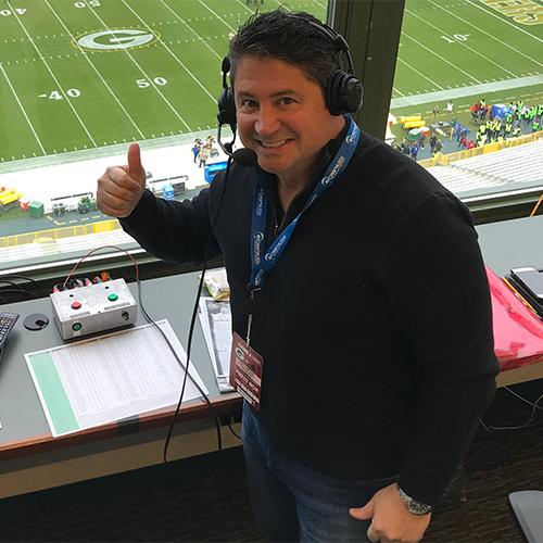 Mike Damergis in the Green Bay packers booth.