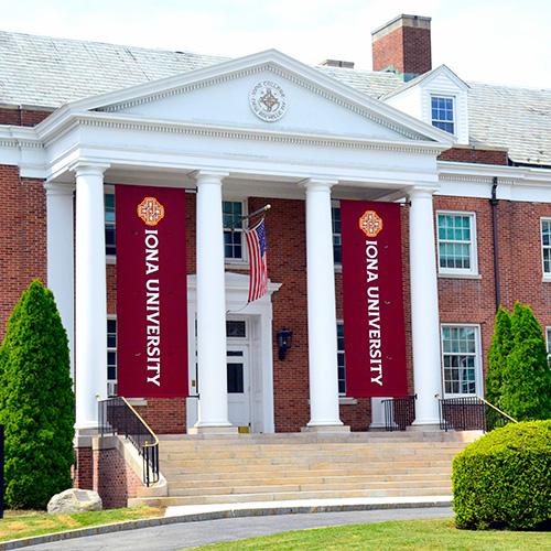 McSpedon Hall with the Iona University banners.