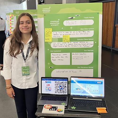 Leah Figueroa with her project at the EIA.