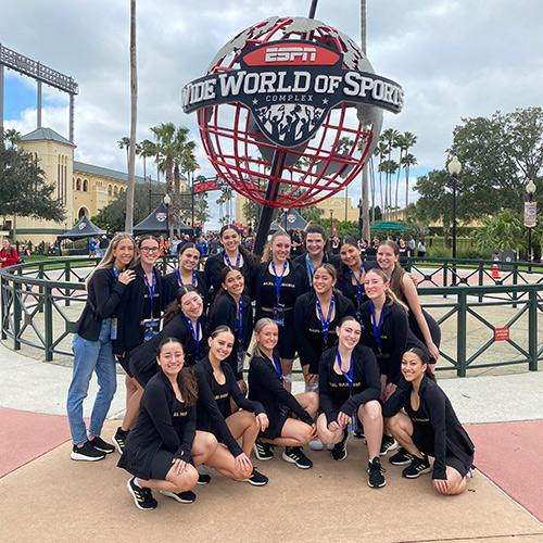 The Iona dance team in front of the ESPN globe.