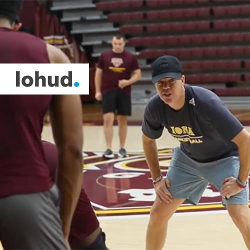 Coach Tobin at basketball practice with the lohud logo.