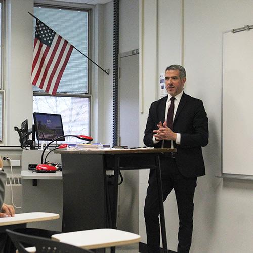 A member of the Secret Service speaks to a Criminal Justice class.
