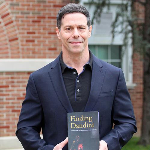 Tom Ruggio with his book, Finding Dandini.