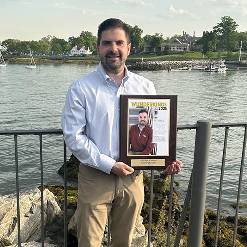 Giuseppe (Joe) D’Aloisio with this award. 