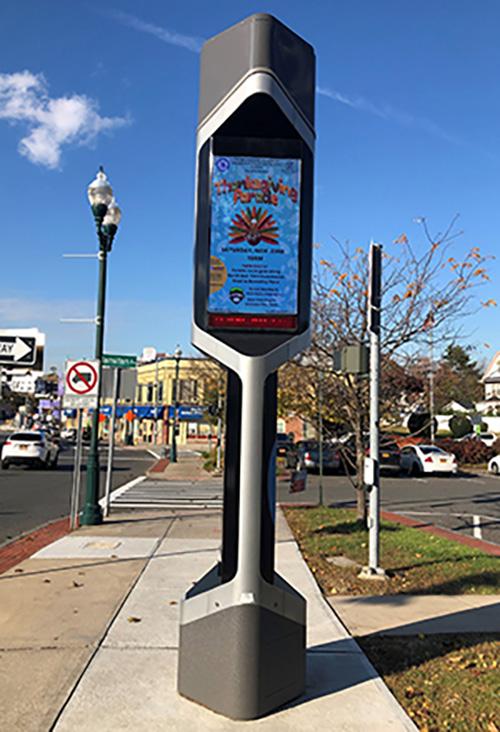 2019 Thanksgiving Parade flier on monitor in New Rochelle.