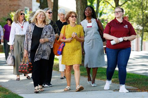 Iona Alumnae take a campus tour at the 50 Years of Women kickoff celebration.