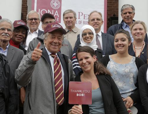 Robert LaPenta gives the thumbs up at the LaPenta School of Business building ceremony.