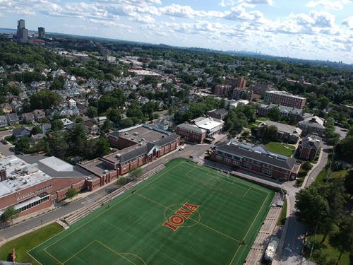 Overhead of Mazzella Field with the city of New Rochelle in the background.