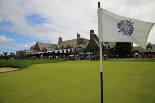 A flag waves in the breeze at the 2019 winged foot golf club fundraiser.