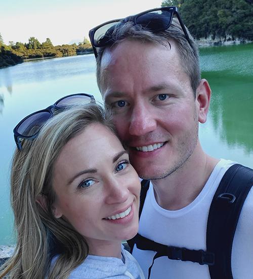 Bill and Amanda Pientka in a boat on a river.