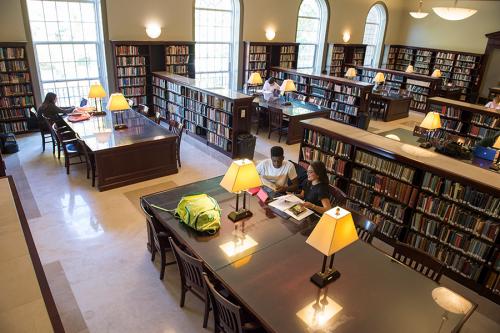 An overhead shot of students working the library in a room nicknamed "the Harry Potter room".