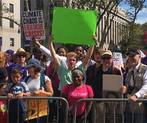 Iona students stand in a crowd of demonstrators at the School Strike for Climate.