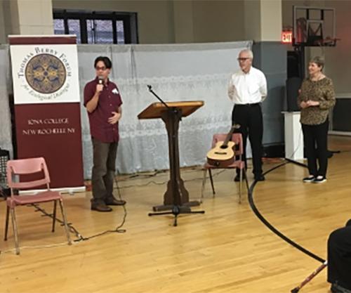 Br. Cawley and Sr. Deignan are being introduced by a speaker before a presentation.