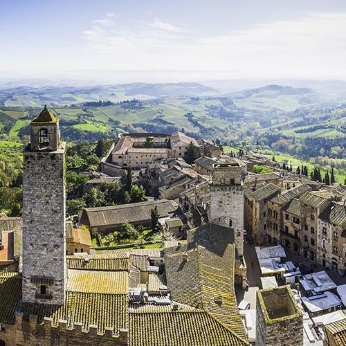 An aerial view of Tuscany, Italy on a sunny day.