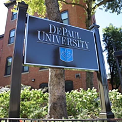 A sign on campus that says DePaul University