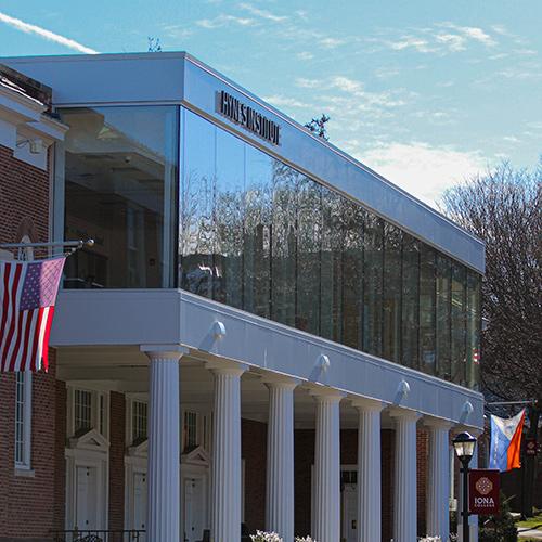 The Hynes Institute on a sunny day with new Iona logos.