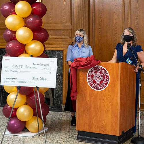 MFT faculty present the check for the stipend.