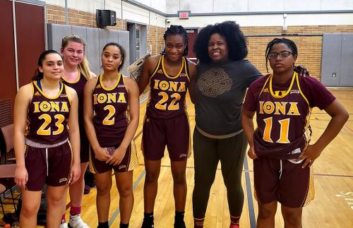 Group photo of the Iona University women's basketball team.